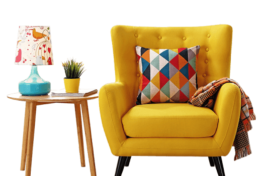 A yellow chair with a colorful pillow beside a lamp in a cozy rental space.